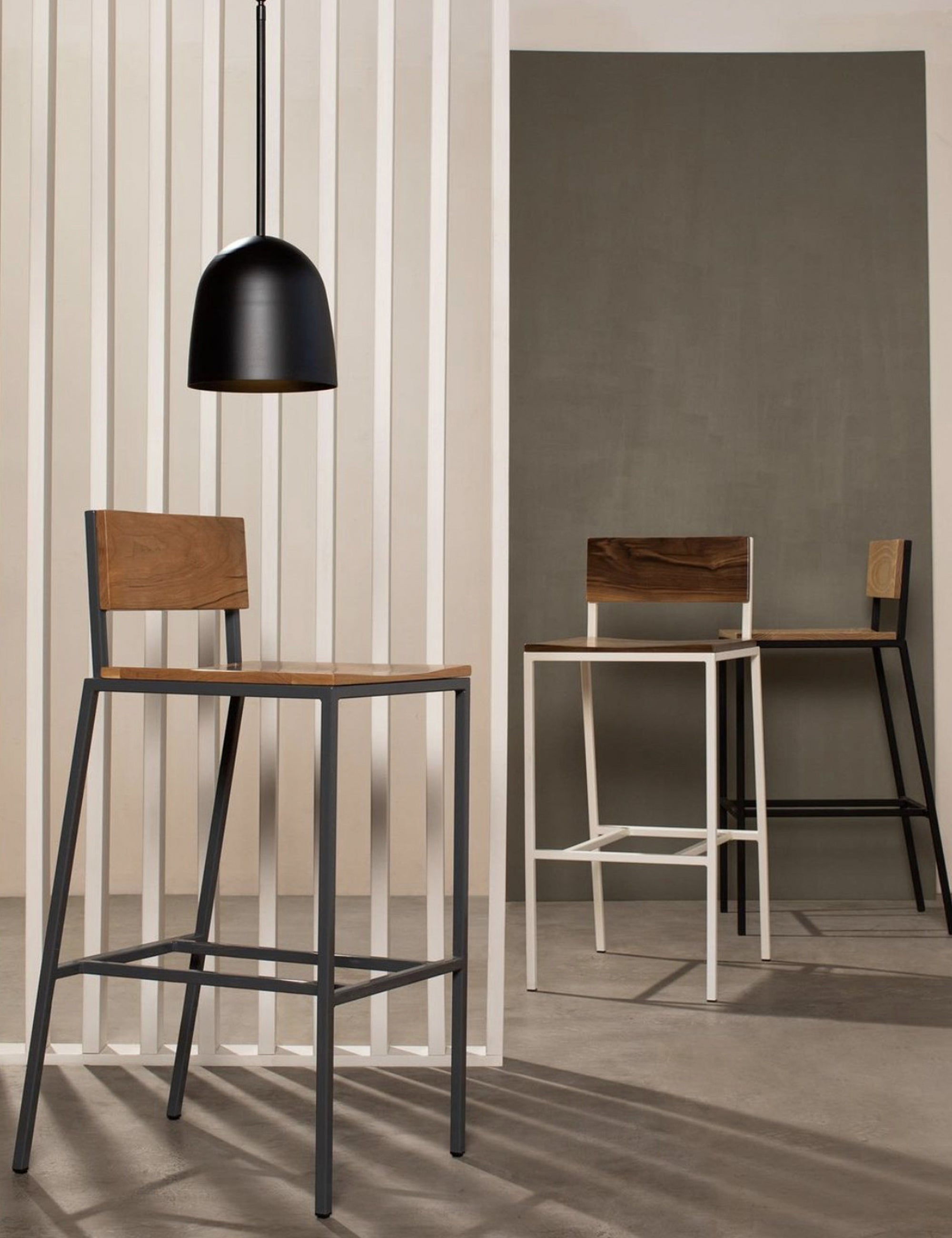 Wood stool and black pendant light