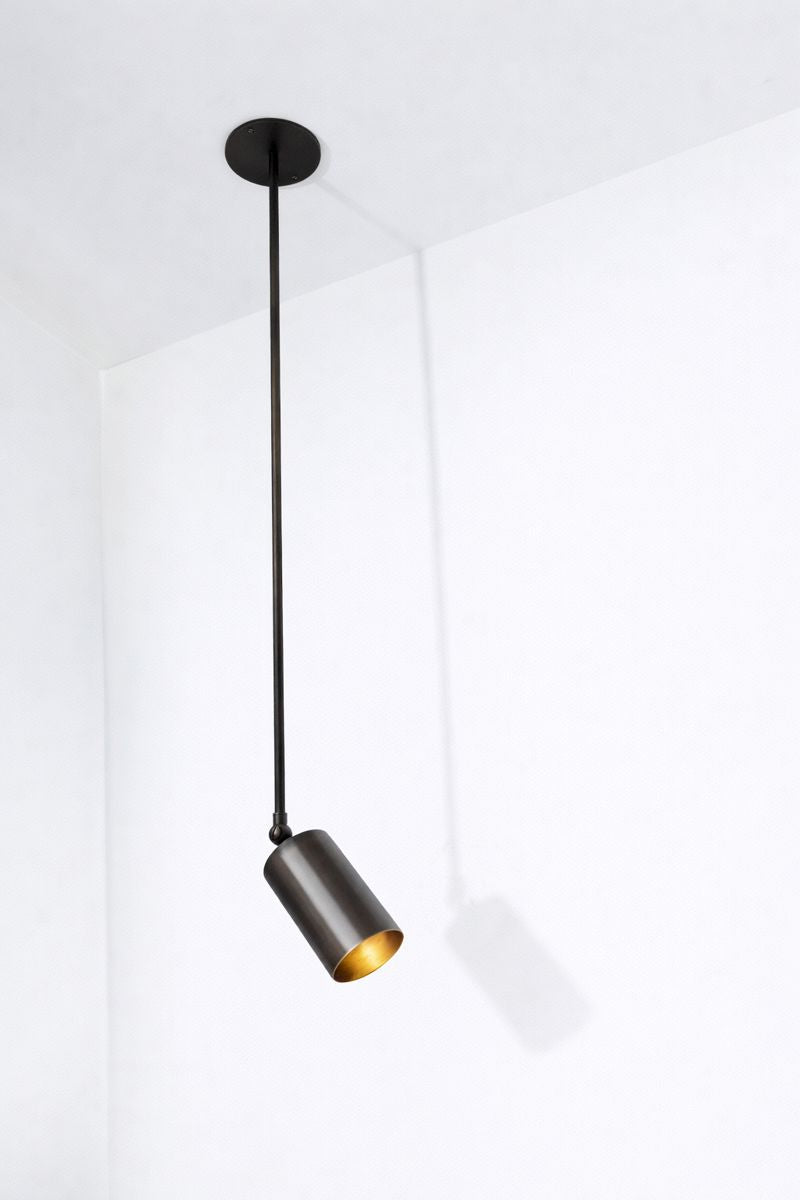 Modern pendant light fixture on a white background