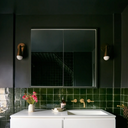 Karma I wall sconce in elegant, modern bathroom