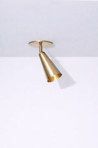 Gold ceiling light fixture on a white background