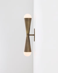 Sideview of Karma II up-down, two-light  brass wall sconce 