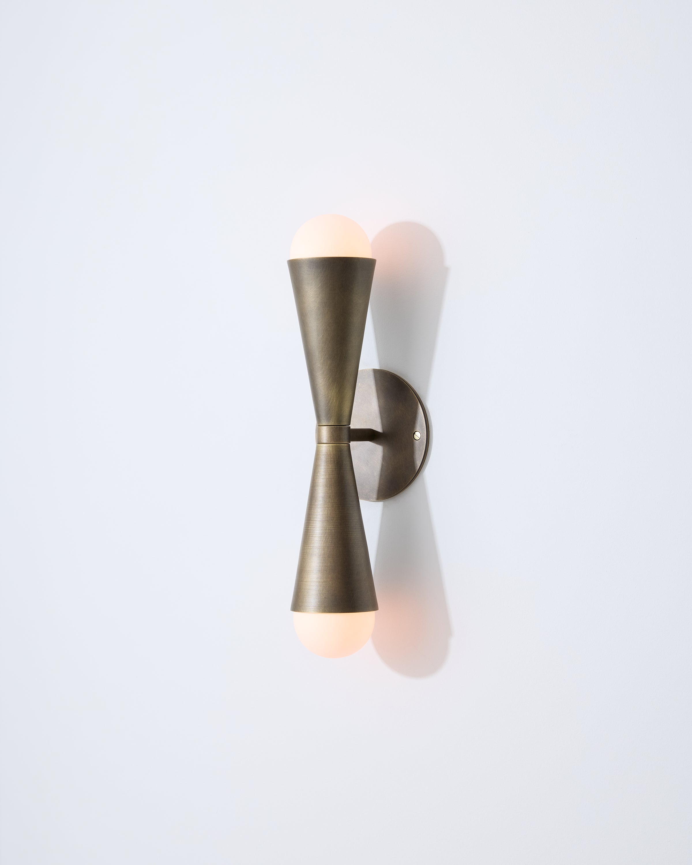 Angled view of Karma II up-down two-light wall sconce