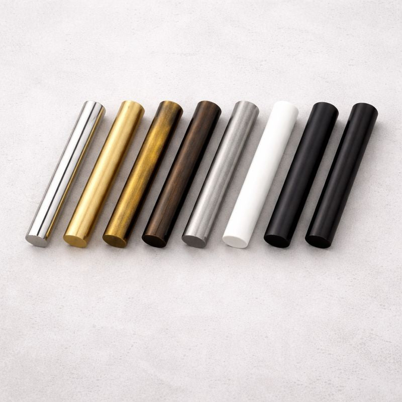 Finish sample set — all eight finishes on brass discs