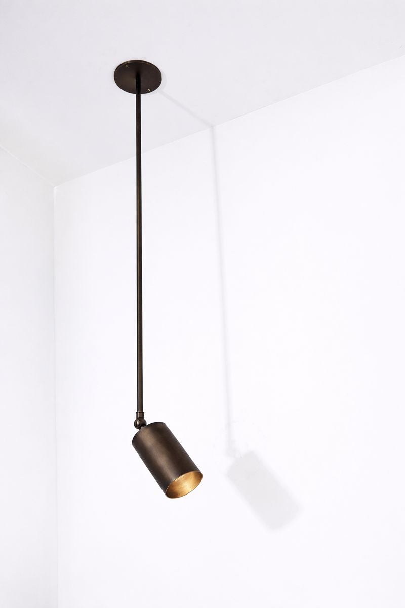 Modern pendant light fixture on a white background